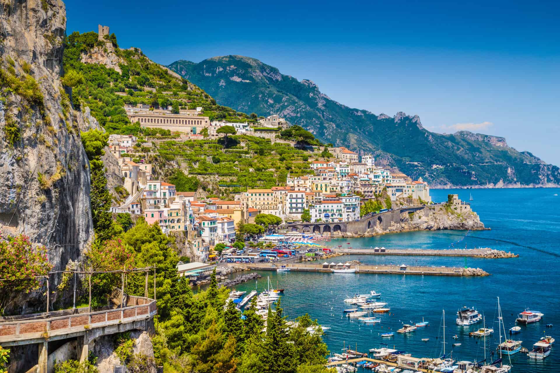 view of the Amalfi Coast with Gulf of Salerno, Italy, fisher boats and sailing boats, Mediterranean Sea.