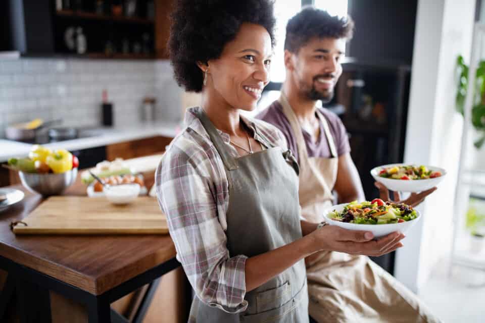 Portrait of happy chefs in kitchen. Healthy food, cooking, people, kitchen